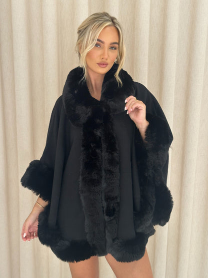 ASPEN Collared Faux Fur Trim Cape Coat In Black